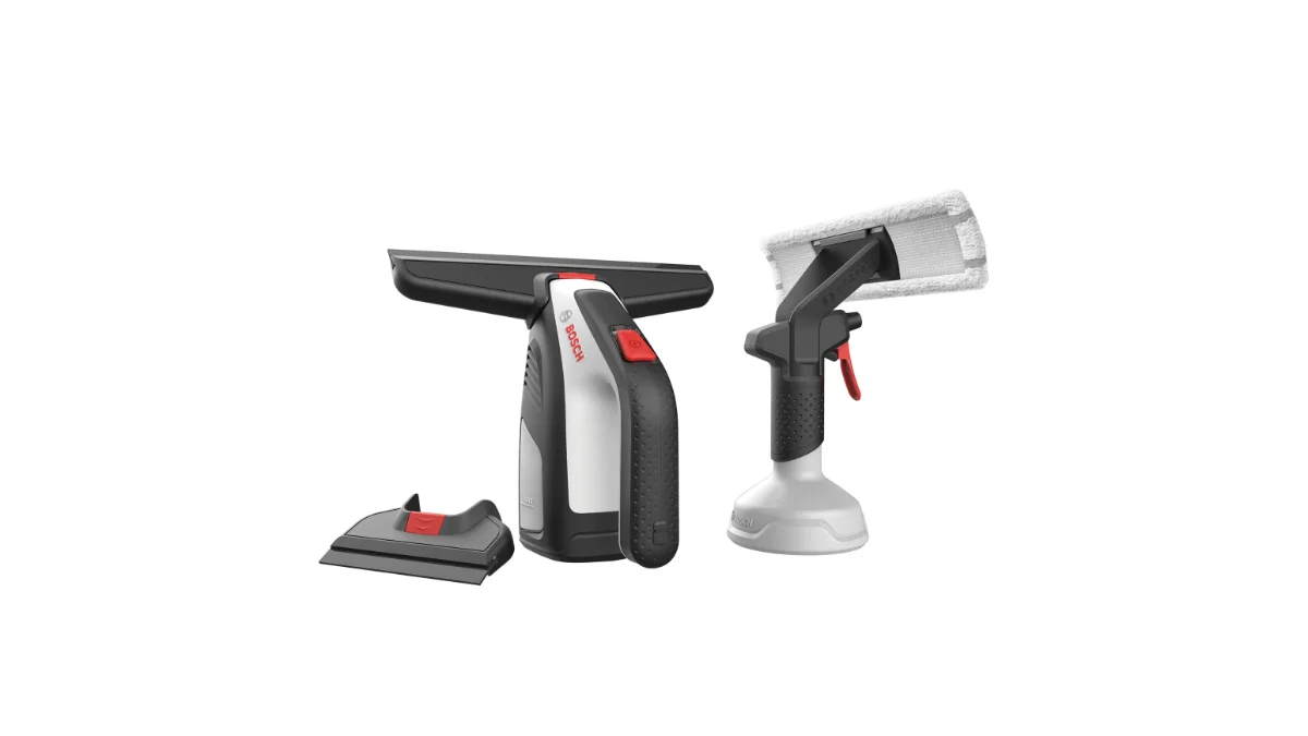 Aspiratorul de geamuri Bosch GlassVAC, negru cu alb și roșu, cu capul mic de aspirare și recipientul aplicator cu pulverizator alături