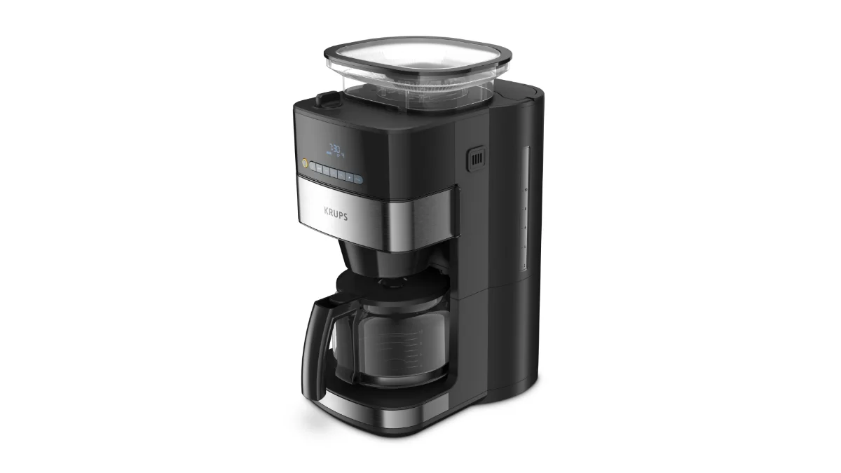 Cafetiera cu râșniță Krups Grind and Brew KM832810, neagră cu argintiu, văzută din trei sferturi, cu recipientul de boabe deasupra