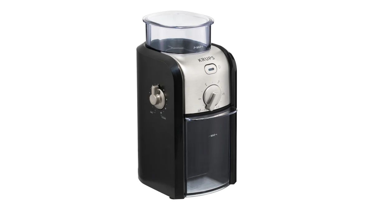 Râșnița de cafea Krups GVX242, neagră cu argintiu, văzută din trei sferturi, cu recipientul transparent pentru boabe deasupra