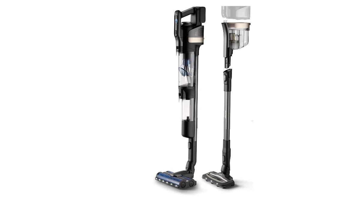 Aspiratorul Philips AquaTrio 9000 XW9463/11 lângă stația lui de andocare