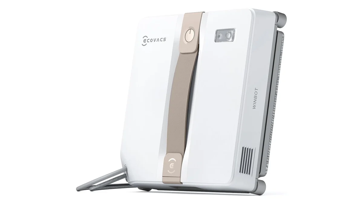 Robotul de geamuri Ecovacs WINBOT MINI, bej cu alb, așezat vertical pe suportul lui